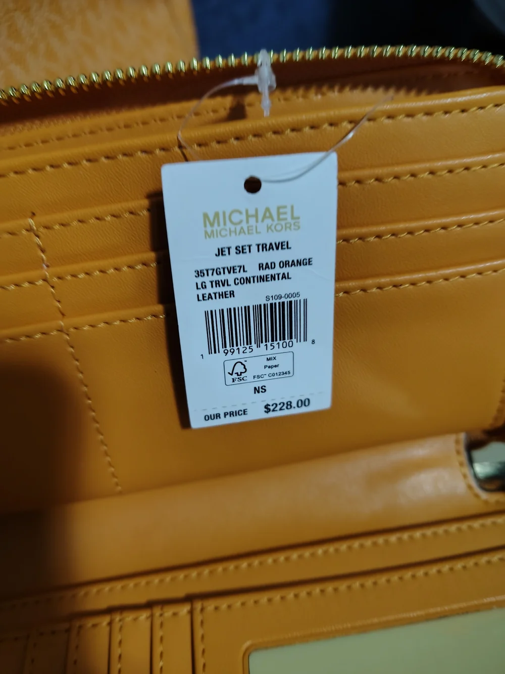 Michael Kors Orange Zip-Around Leather Wallet